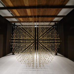 Arin Rungjang, 'Golden Teardrop', 2013, Steel frame, 6,000 suspended brass teardrops, 30 minute single channel video, Image courtesy of Singapore Art Museum