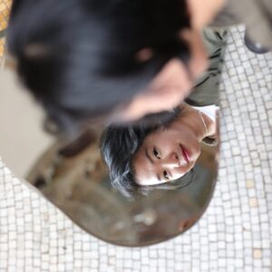 Giang Le. Profile Image from the artists website