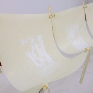 Priyageetha Dia, 'Rest_Core’, 2022, white ink, bitmap screenprints on off white latex sheets, latex sash, nickel grommets, 320 x 170 x 270 cm. Image from Yeo Workshop