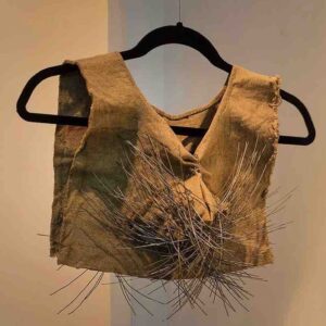 Judy-Freya-Sibayan,-‘Scapular-Gallery-Nomad-#1-(Artwork-and-Gallery-are-one-and-the-same)’,-1998,-jute-textile-(embroidered-and-labelled-with-permanent-marker),-wire,-safety-pin-and-catalogue,-variable-dimensions.-Image-from-Silverlens-Gallery